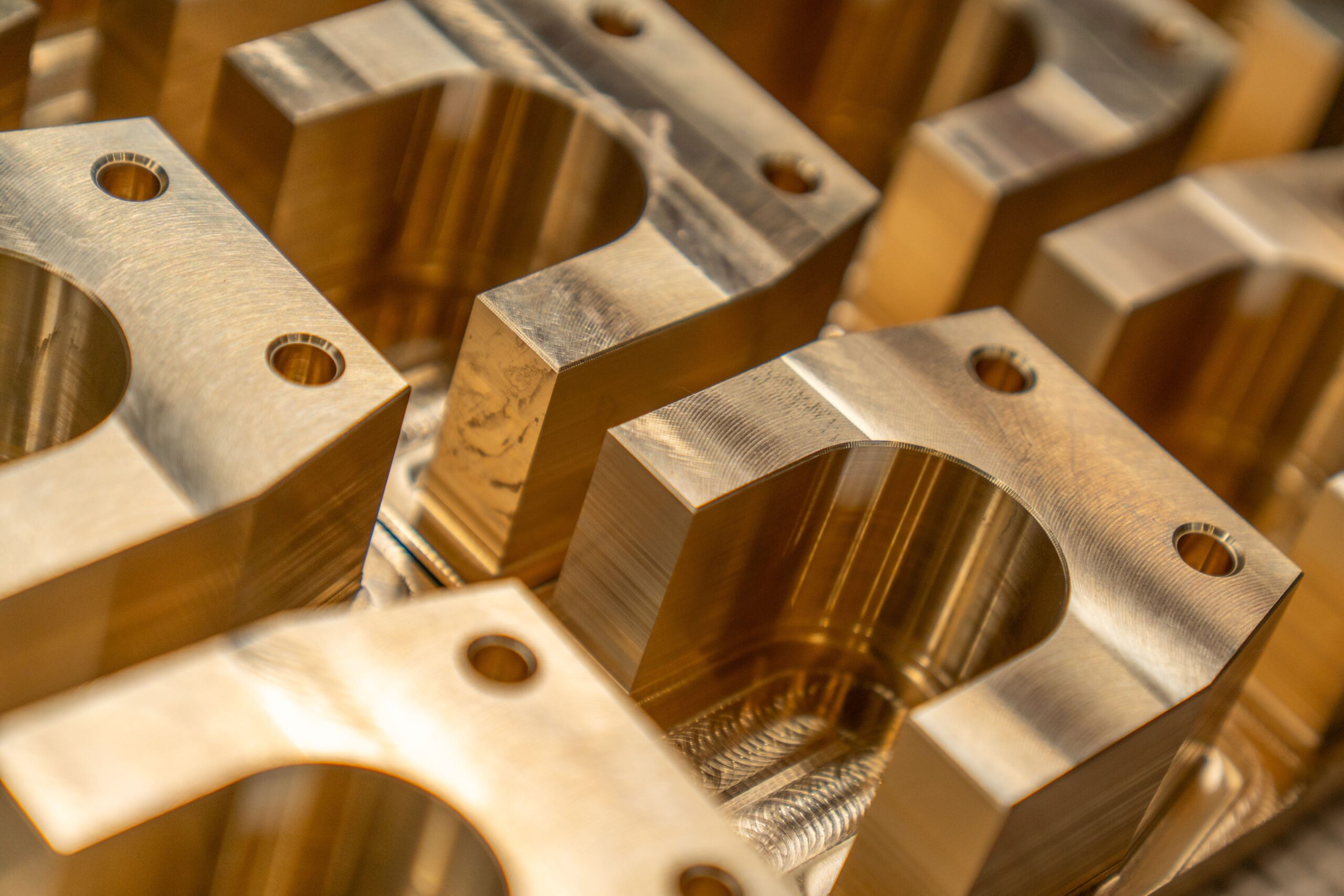 automotive Detailed close-up of machined metal components in an industrial setting.